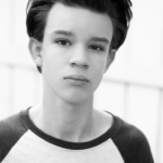 Black and white headshot for James Wood. White male child. 