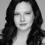 Black and white headshot for Jessica Williams. White female with long brown hair.