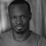 Black and white headshot for Michael Ward. African American male with short hair.