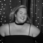 Black and white headshot for Dawn Davridge. Caucasian female with light hair.